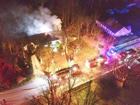 Two people taken to hospital after fire in Eastham
